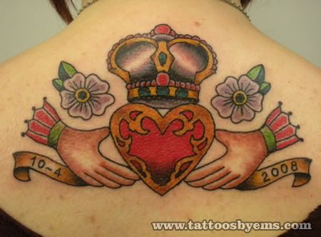Cindy's claddagh tattoo on her back by me
